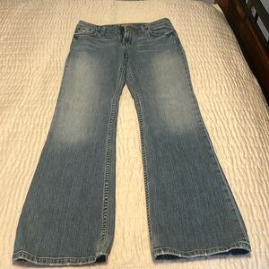 BKE jeans. Size 8 or 29 x 32 1/2. Sits below waist. Flared leg.